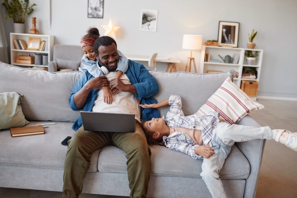 Single Father Playing with Two Daughters